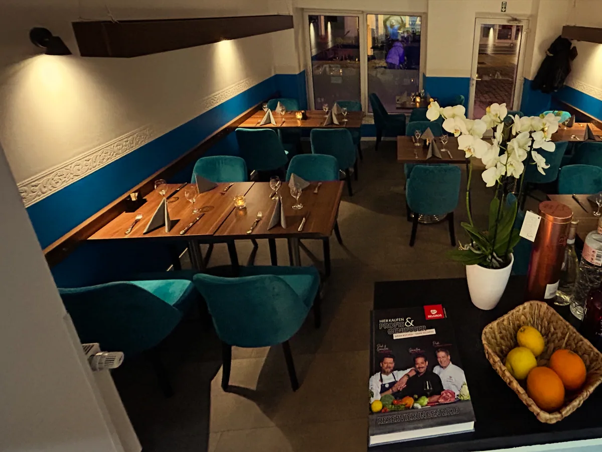 Sala di La Pasteria con tavoli apparecchiati